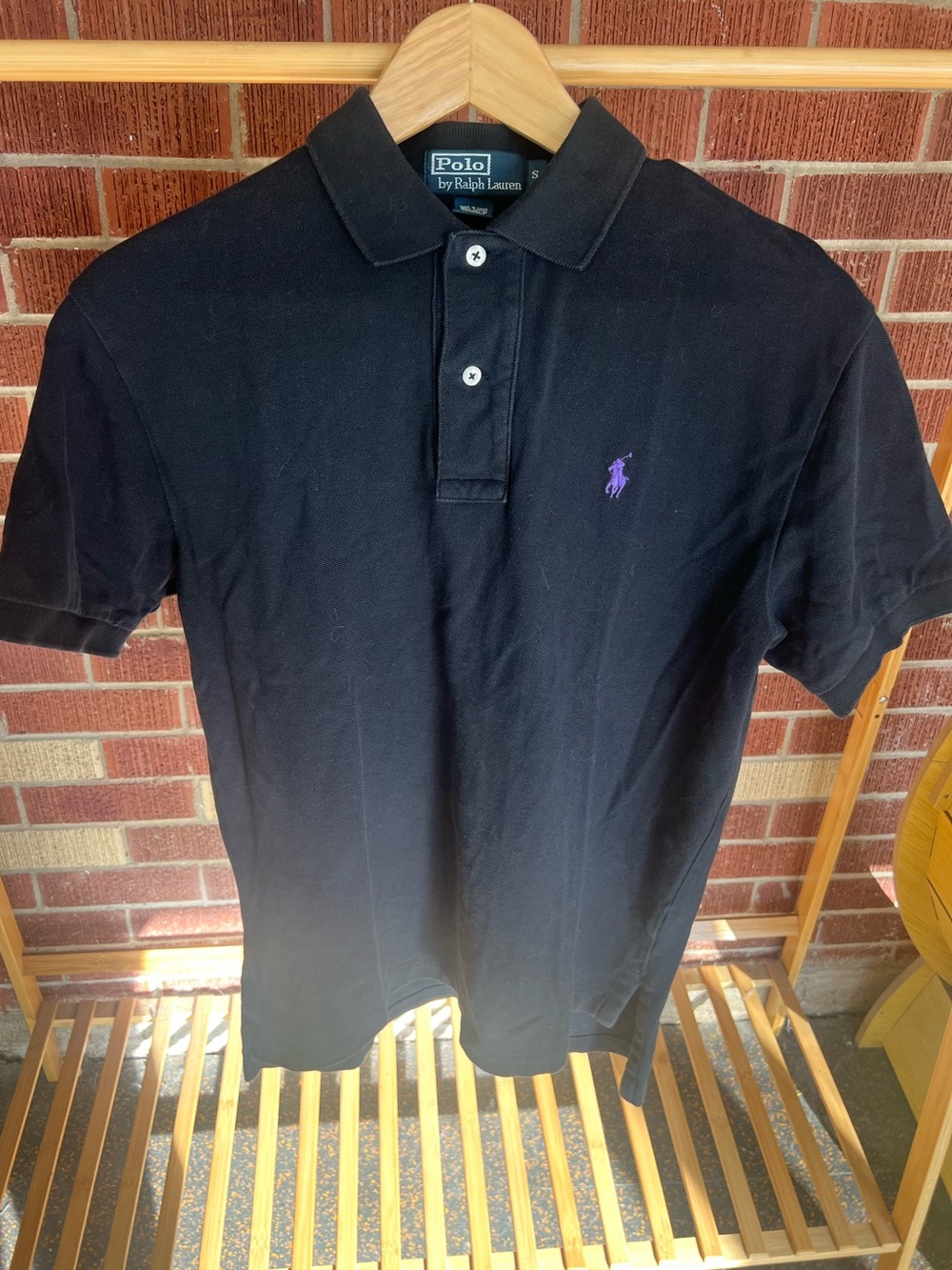 Black polo tee
